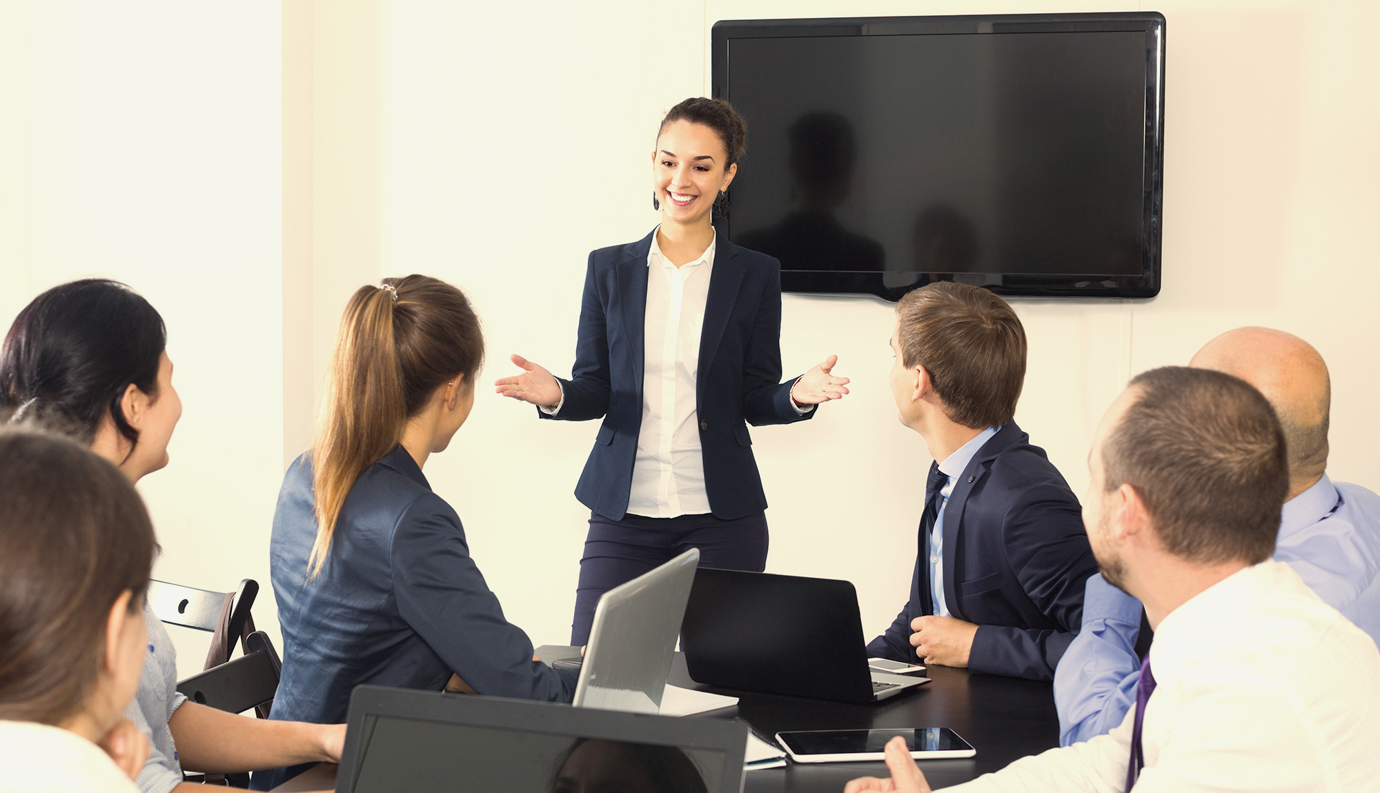 woman standing in front of group of people