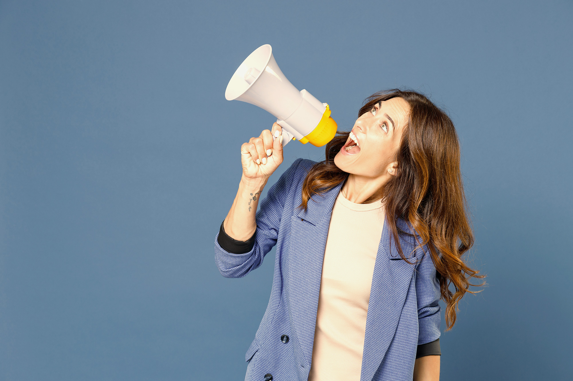 woman speaking through megaphone